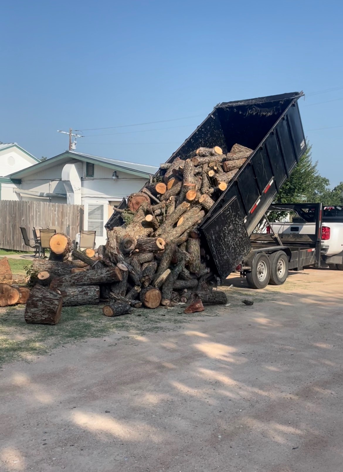 CAT skid steer clearing land near Marble Falls TX — Flag Creek Tree Service