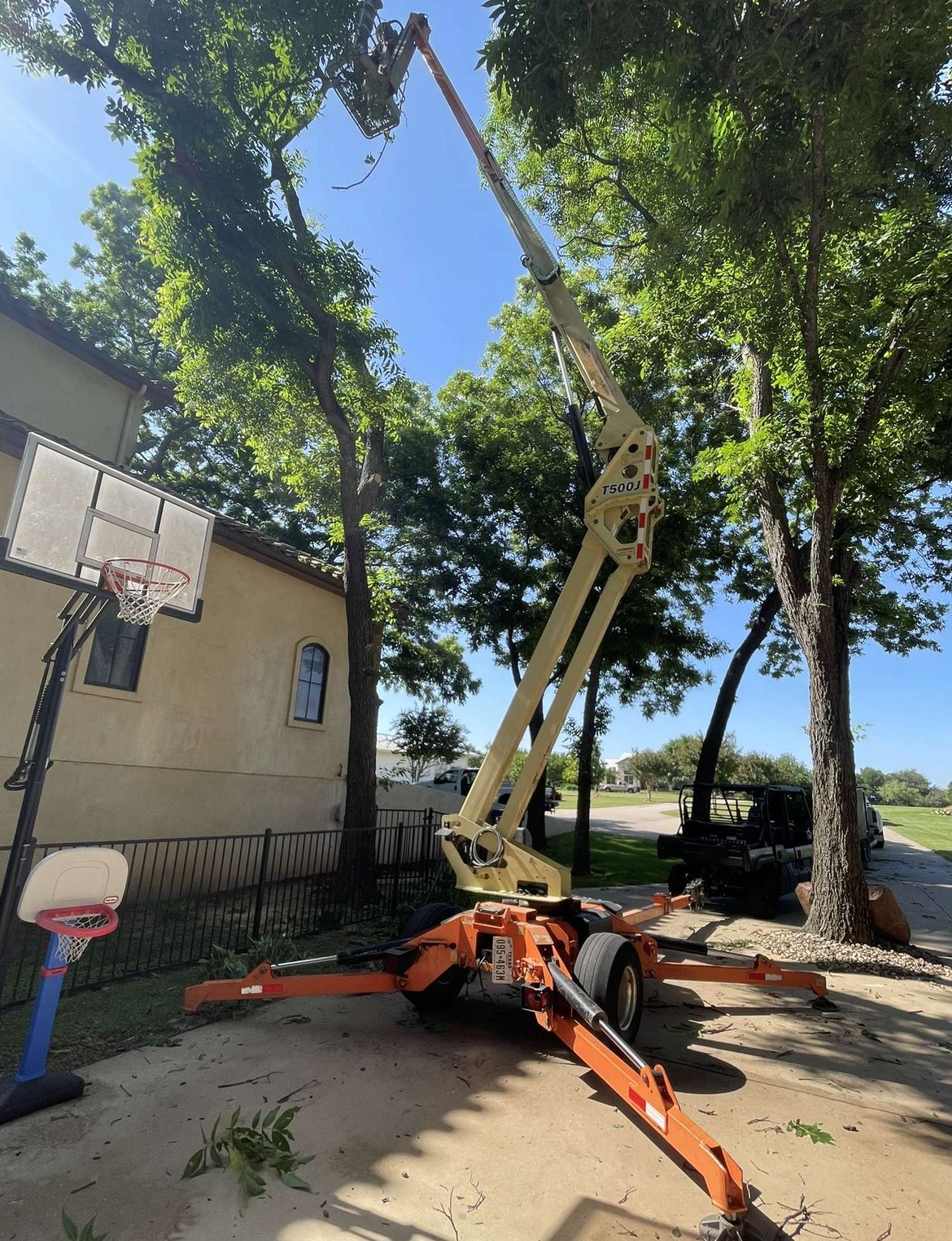 Aerial view of tree trimming and log hauling job in Marble Falls TX